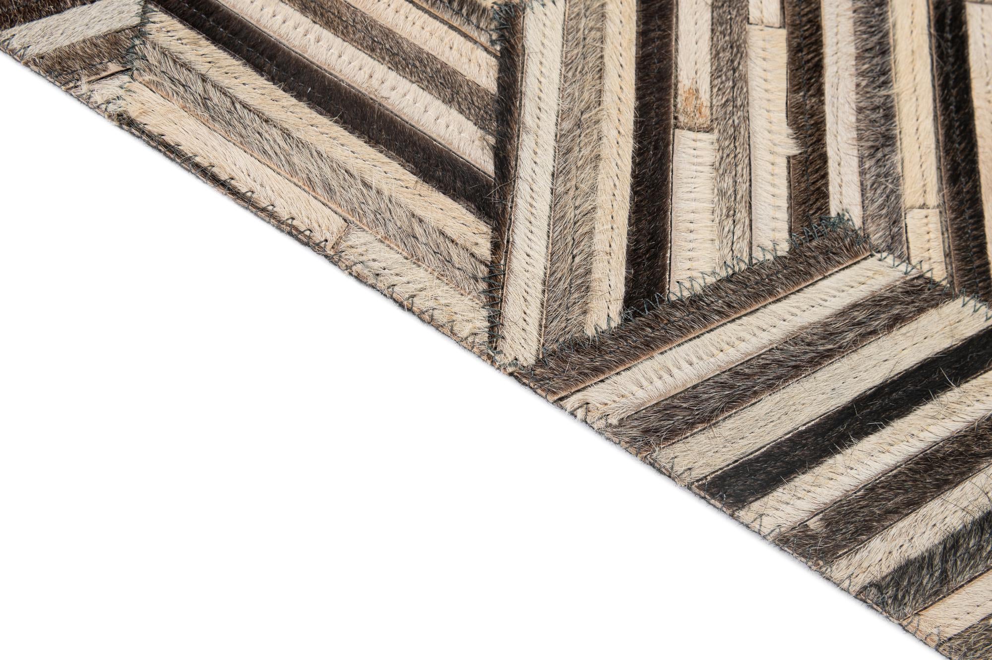 4' 11 x 8' 1 Cowhide - Patchwork Rug