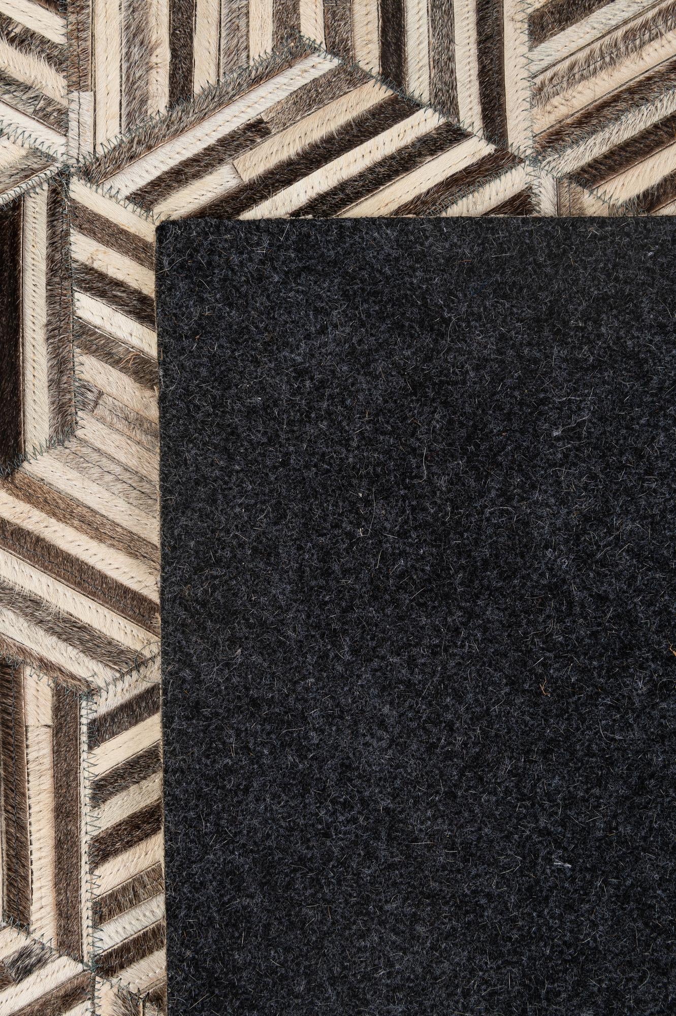 4' 11 x 8' 1 Cowhide - Patchwork Rug
