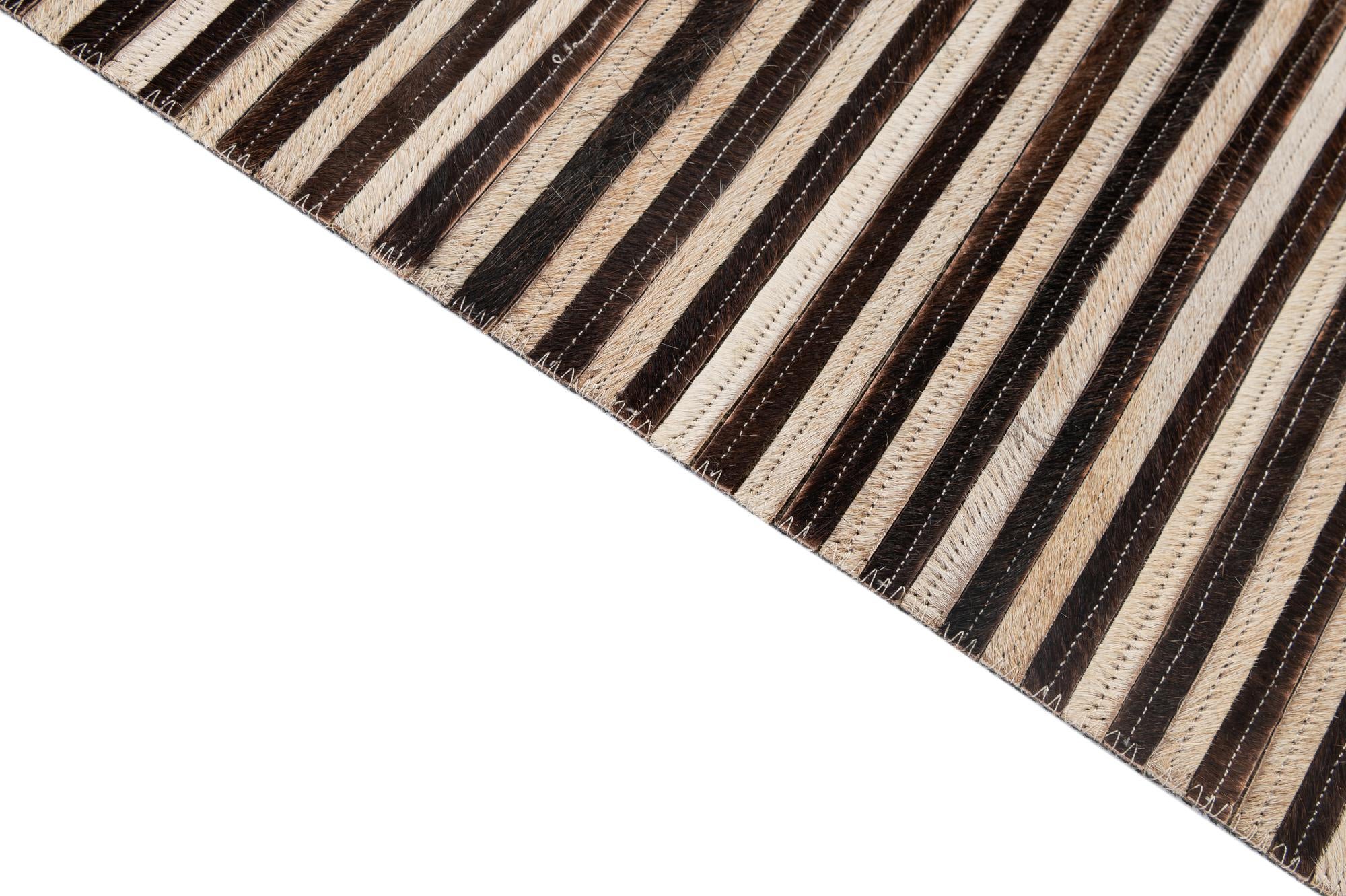 5' 1 x 8' 3 Cowhide - Patchwork Rug