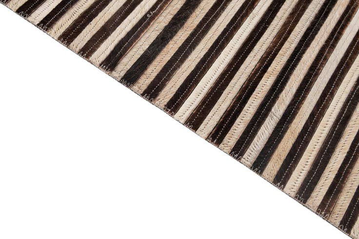 Detail image of 5' 1 x 8' 3 Cowhide - Patchwork Rug