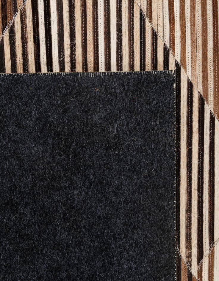 Detail image of 5' 1 x 8' 3 Cowhide - Patchwork Rug