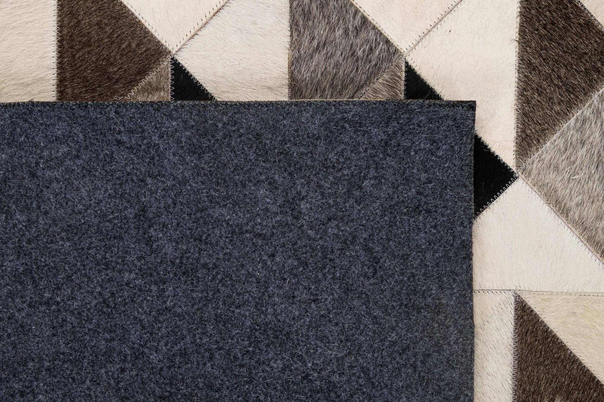 5' 3 x 8' 1 Cowhide - Patchwork Rug