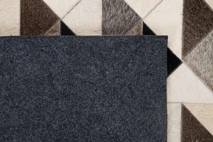 5' 3 x 8' 1 Cowhide - Patchwork Rug