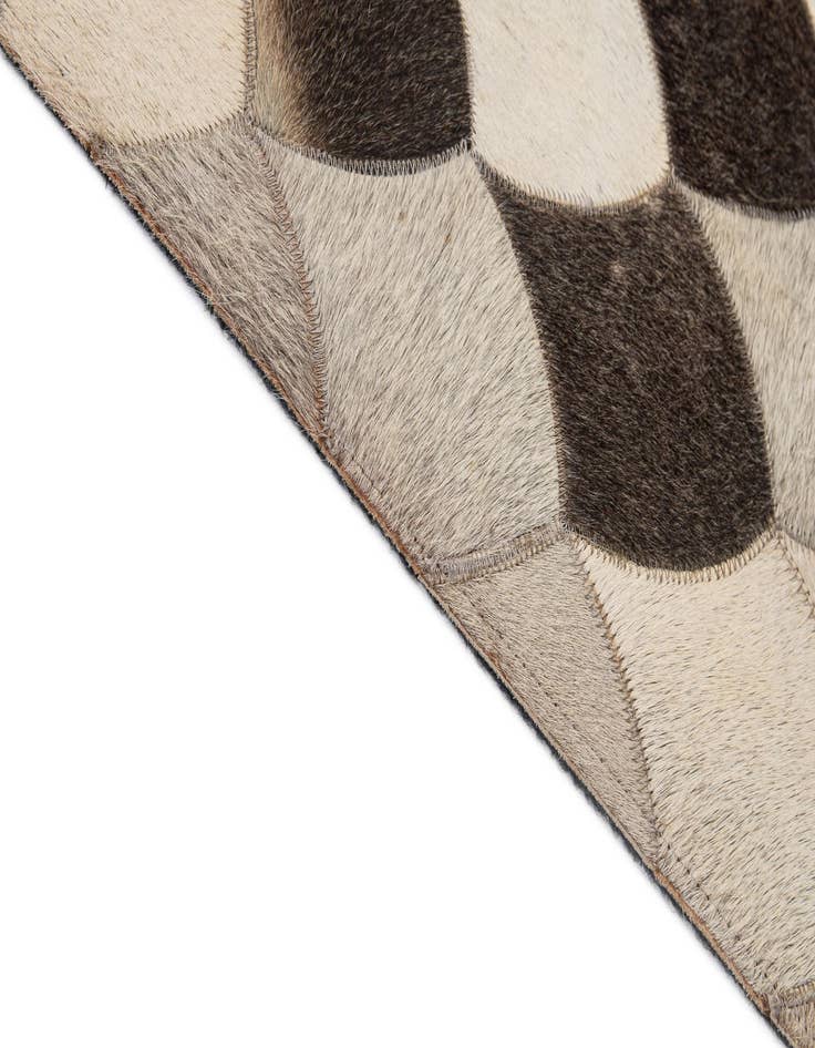 Detail image of 5' 1 x 8' Cowhide - Patchwork Rug