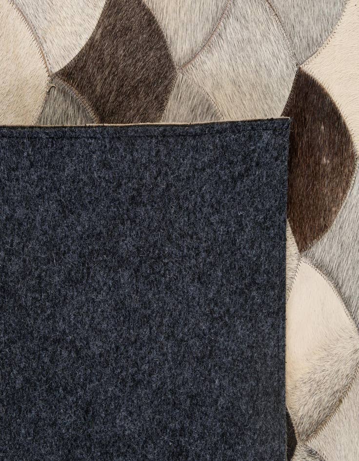 Detail image of 5' 1 x 8' Cowhide - Patchwork Rug