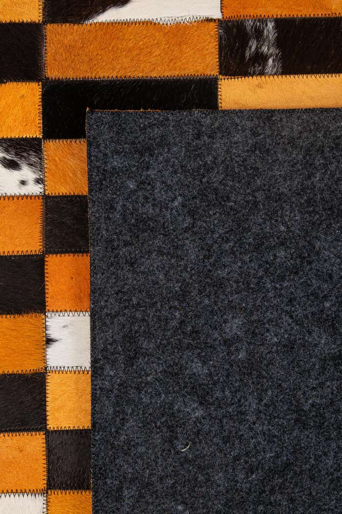5' 2 x 7' 11 Cowhide - Patchwork Rug