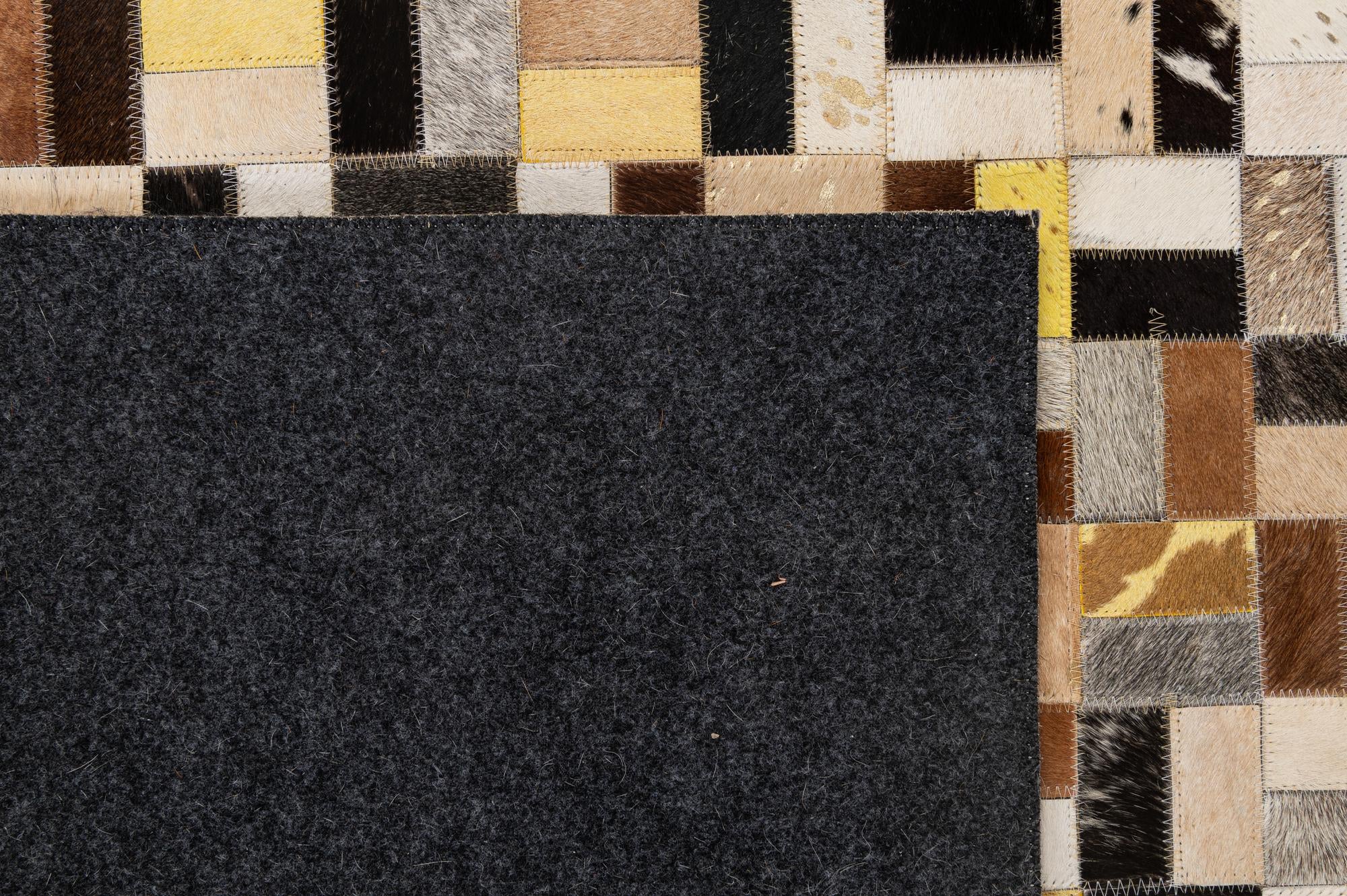 5' 1 x 8' Cowhide - Patchwork Rug