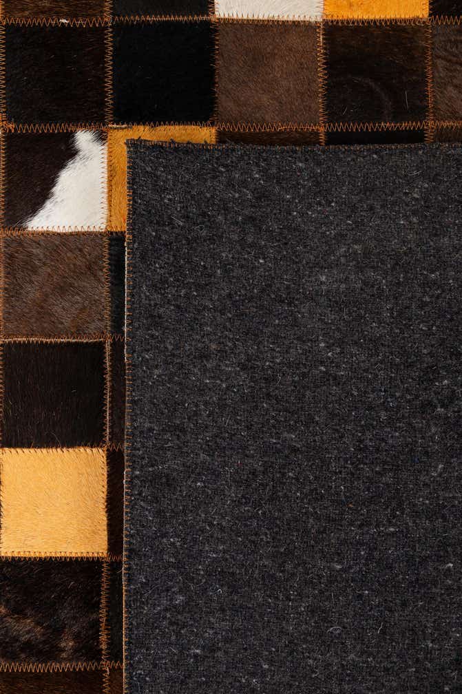 5' 1 x 8' 1 Cowhide - Patchwork Rug