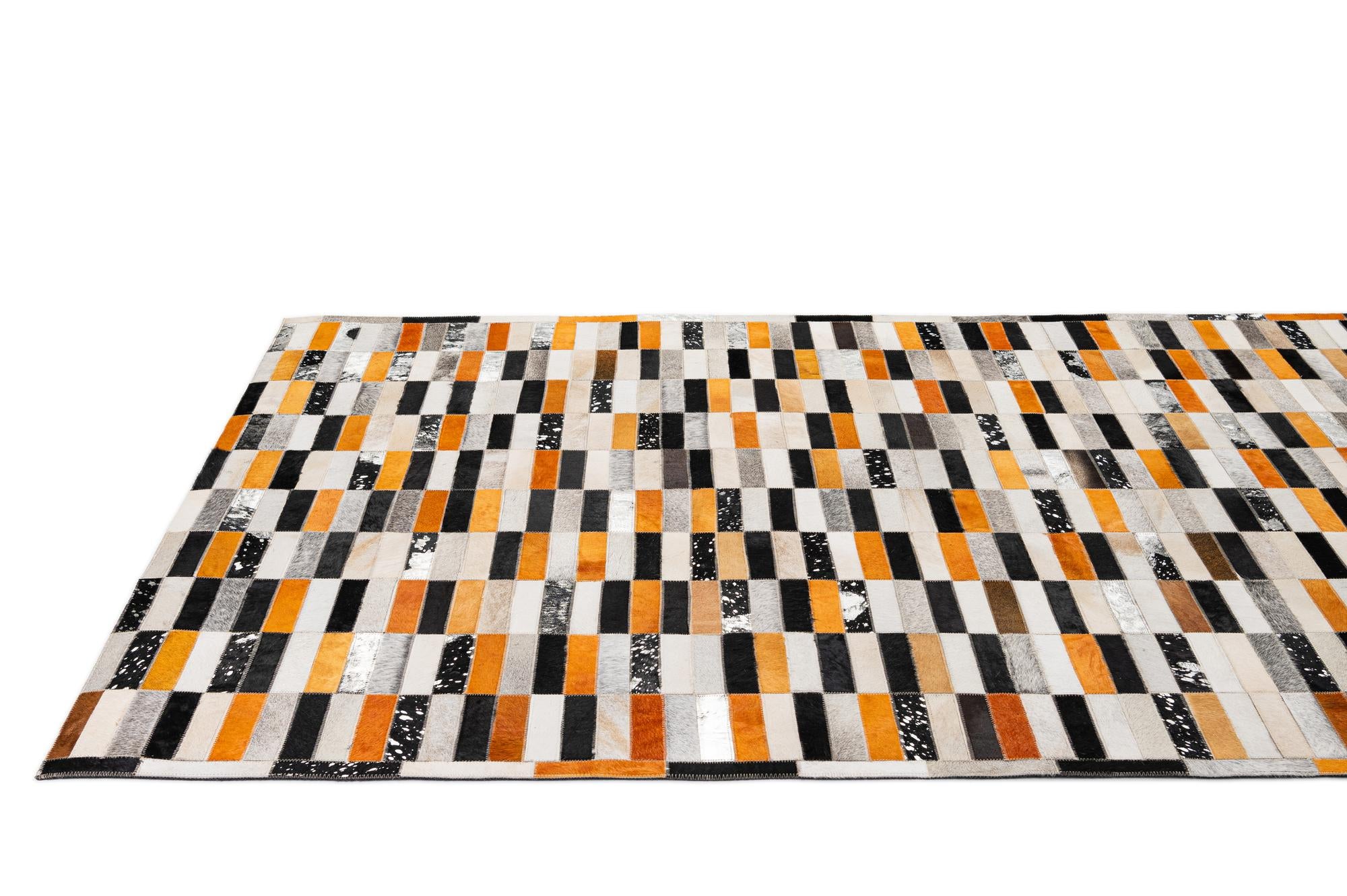 5' 2 x 8' 2 Cowhide - Patchwork Rug