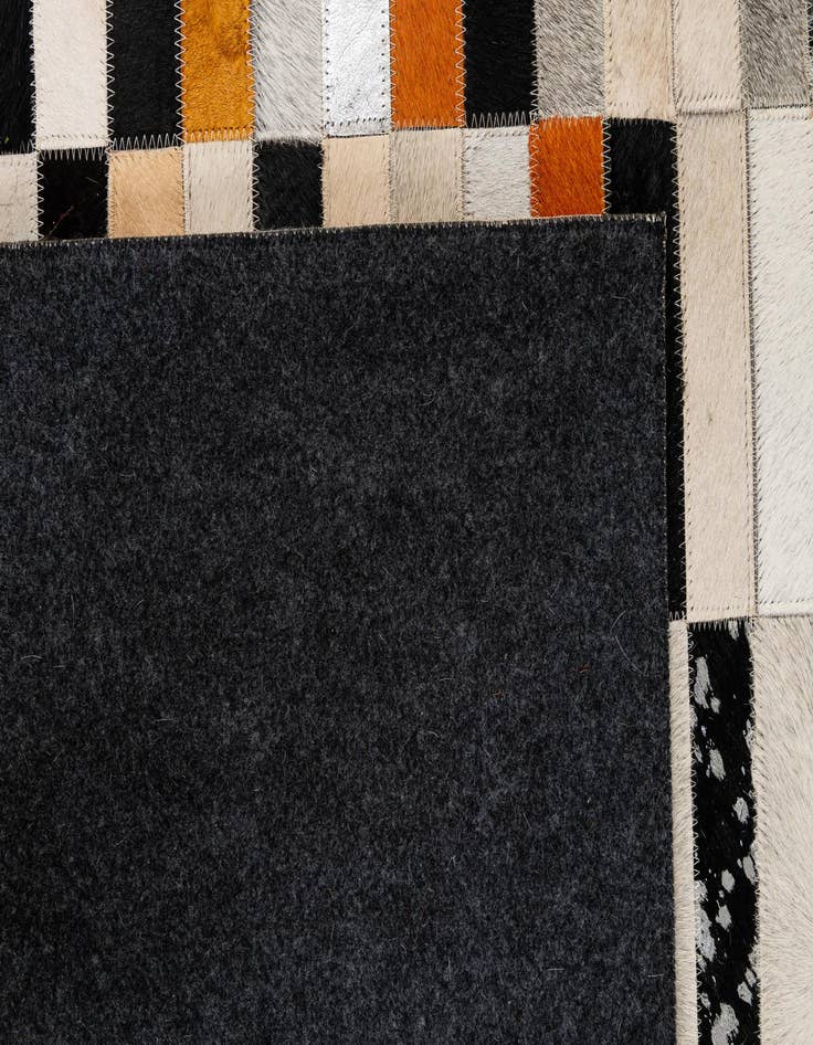 Detail image of 5' 2 x 8' 2 Cowhide - Patchwork Rug
