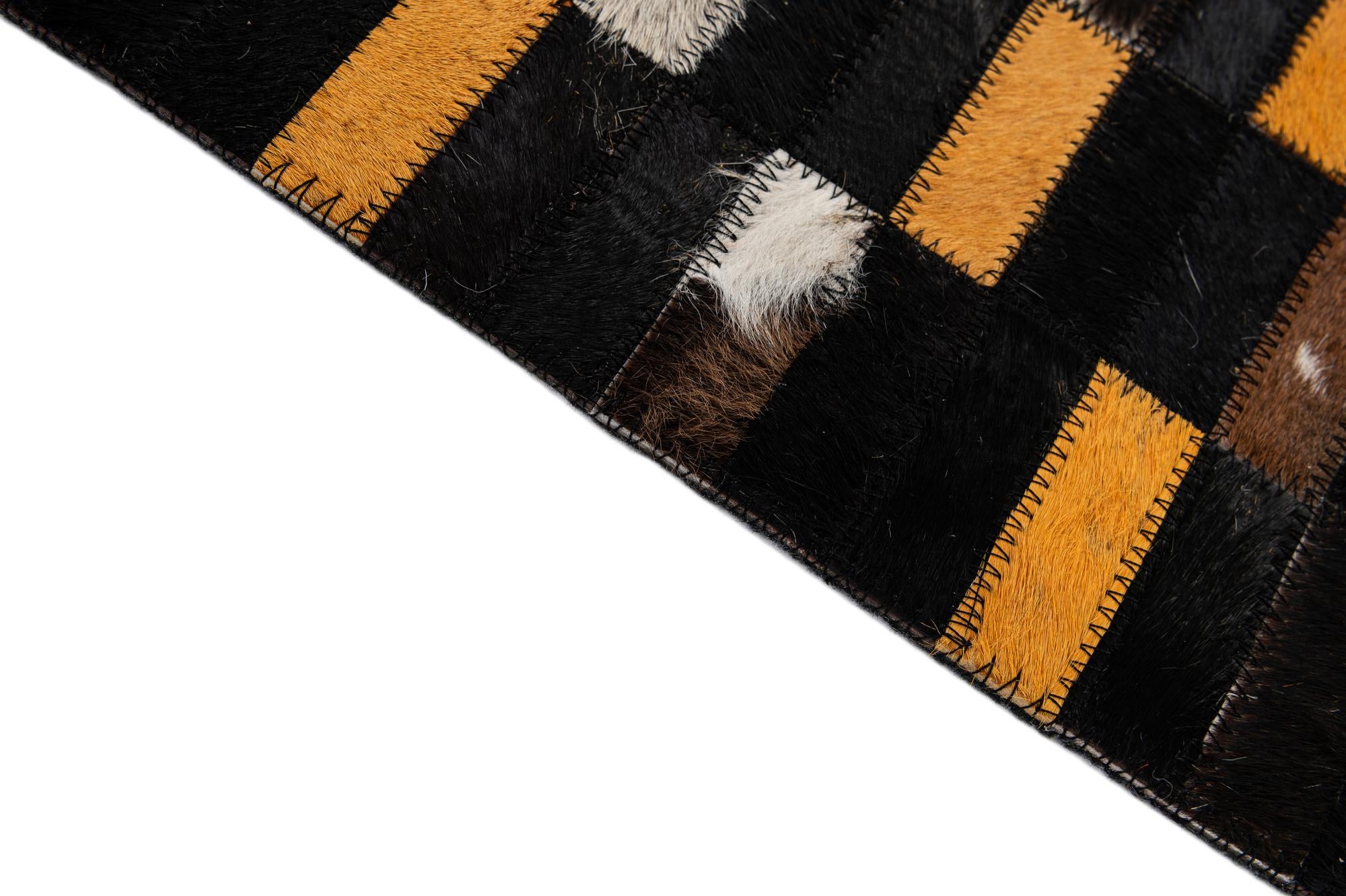 4' 11 x 8' 1 Cowhide - Patchwork Rug