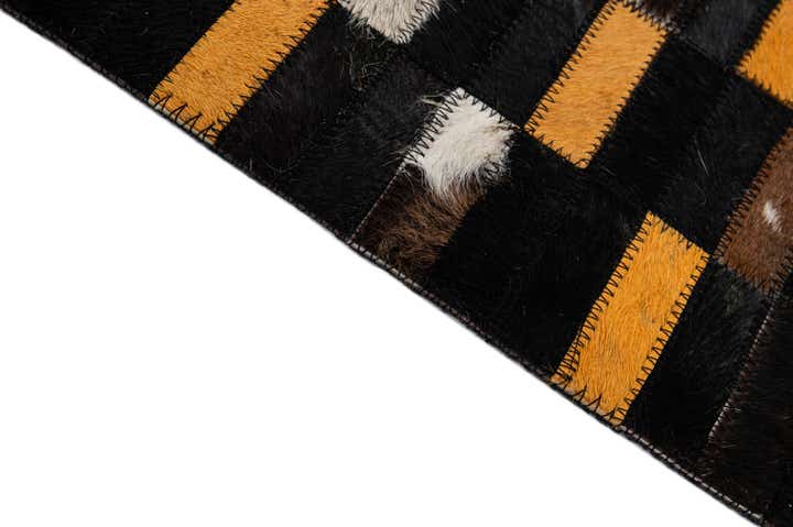 4' 11 x 8' 1 Cowhide - Patchwork Rug