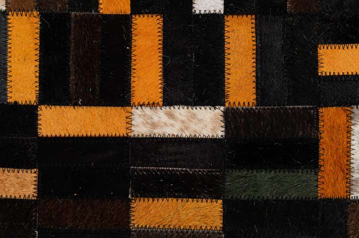 4' 11 x 8' 1 Cowhide - Patchwork Rug