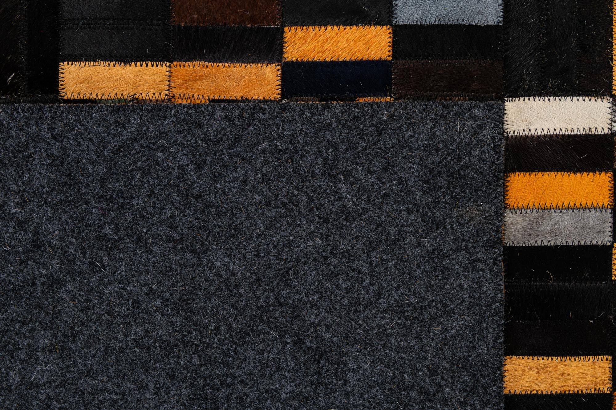 4' 11 x 8' 1 Cowhide - Patchwork Rug