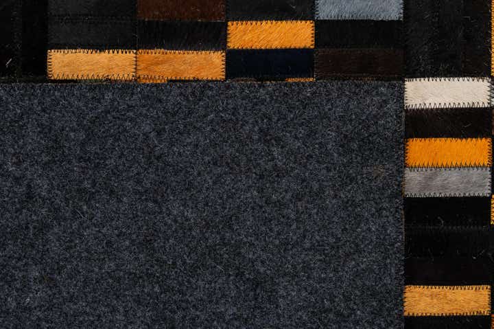 4' 11 x 8' 1 Cowhide - Patchwork Rug