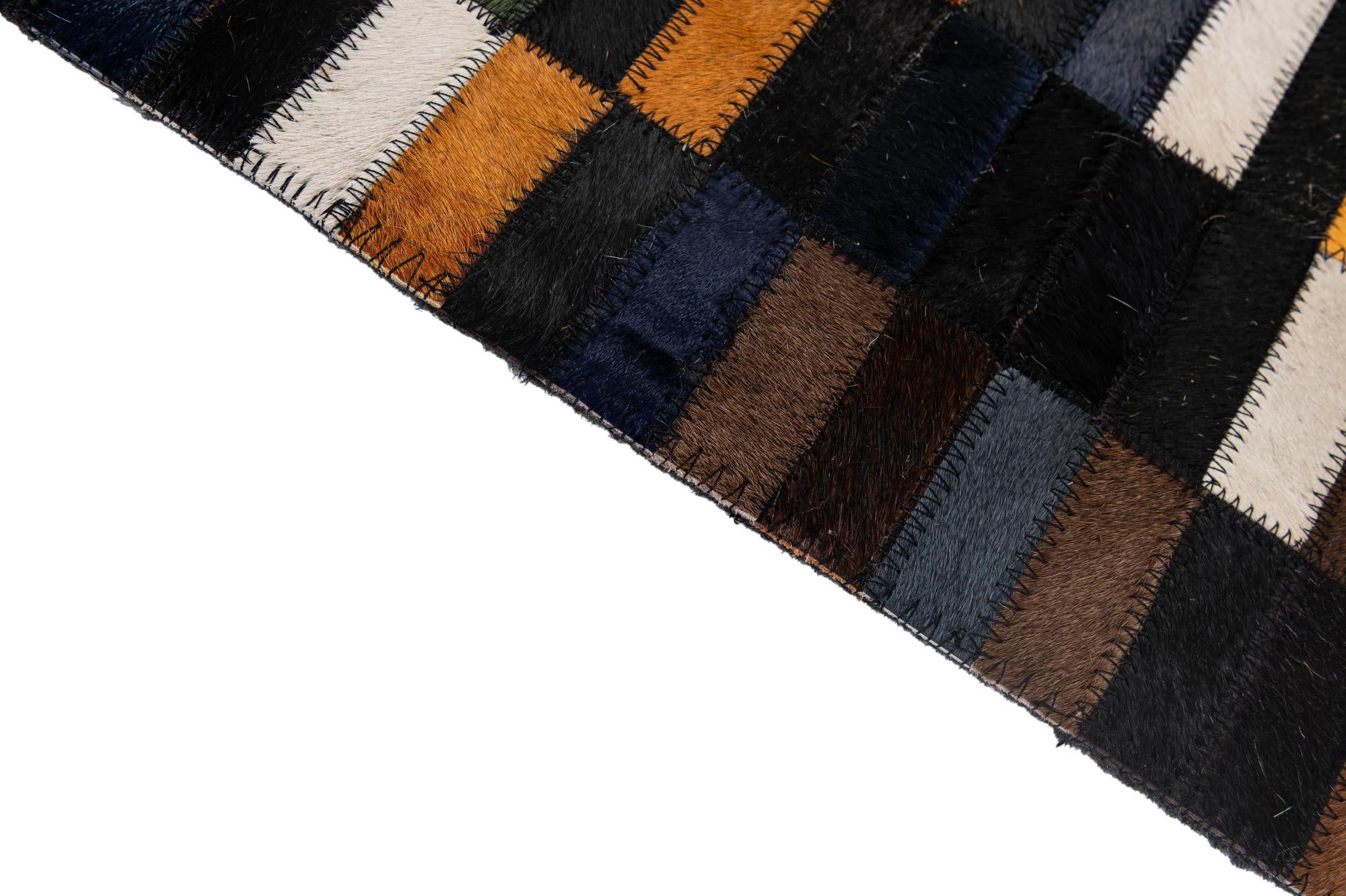 5' 2 x 7' 11 Cowhide - Patchwork Rug