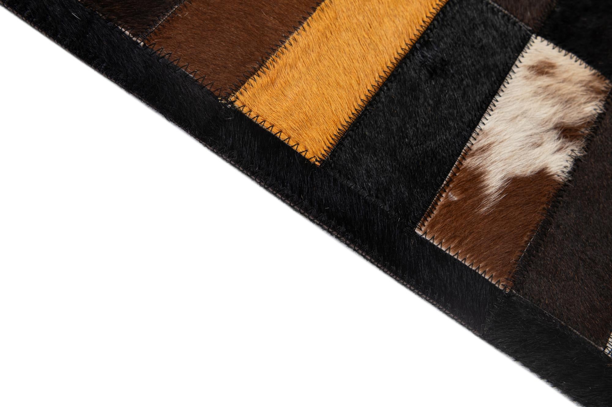 5' 2 x 8' 1 Cowhide - Patchwork Rug
