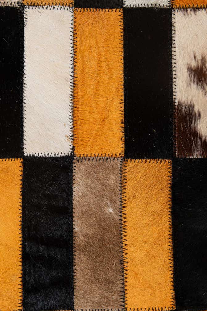 5' 2 x 8' 1 Cowhide - Patchwork Rug