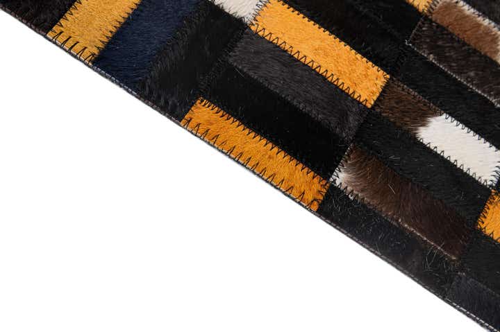 4' 11 x 8' 1 Cowhide - Patchwork Rug