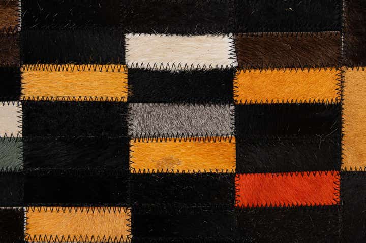4' 11 x 8' 1 Cowhide - Patchwork Rug