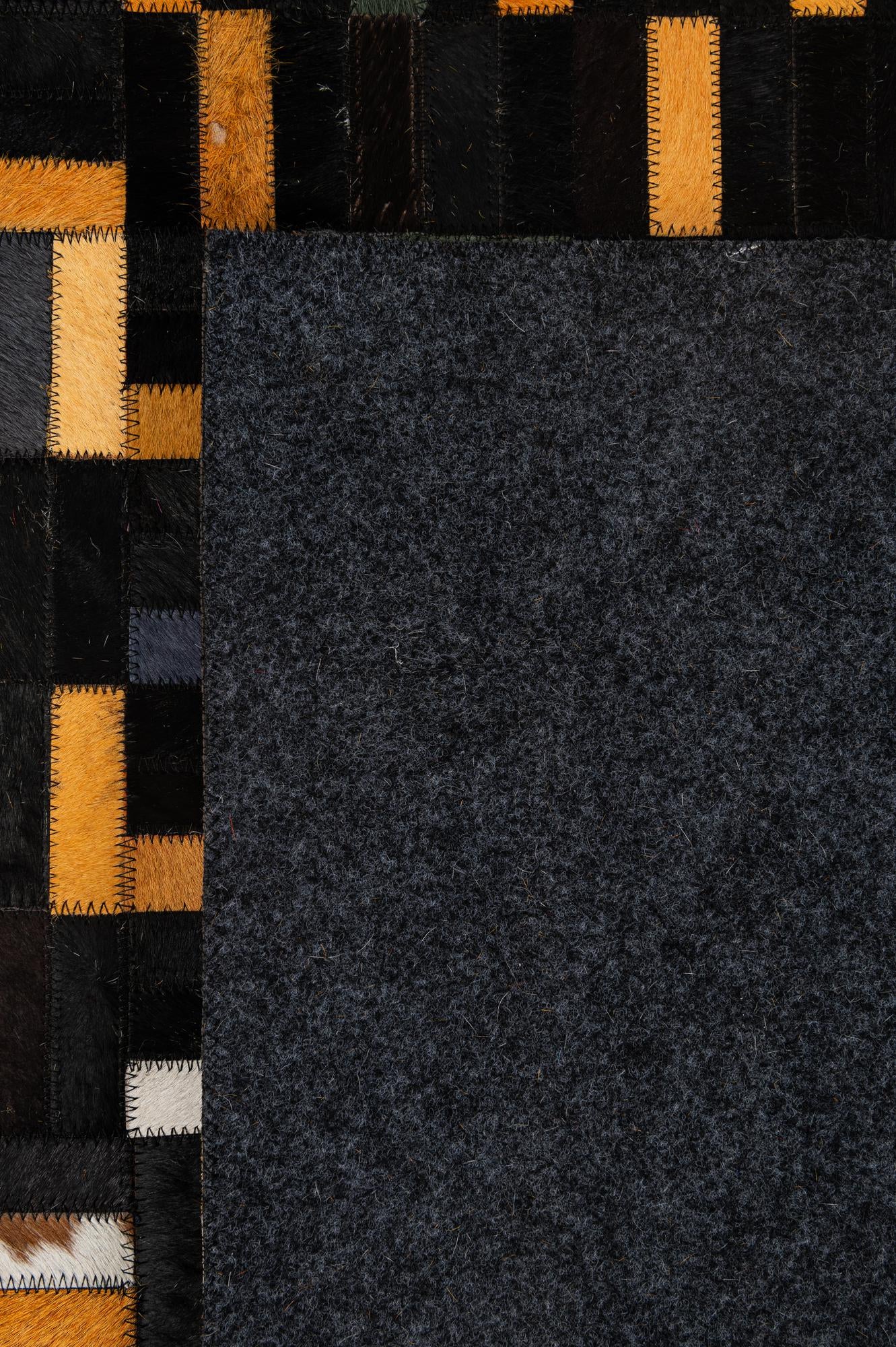 4' 11 x 8' 1 Cowhide - Patchwork Rug