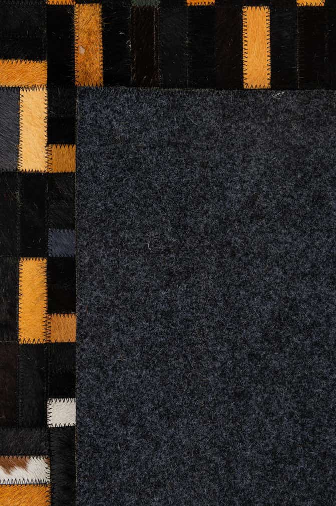 4' 11 x 8' 1 Cowhide - Patchwork Rug