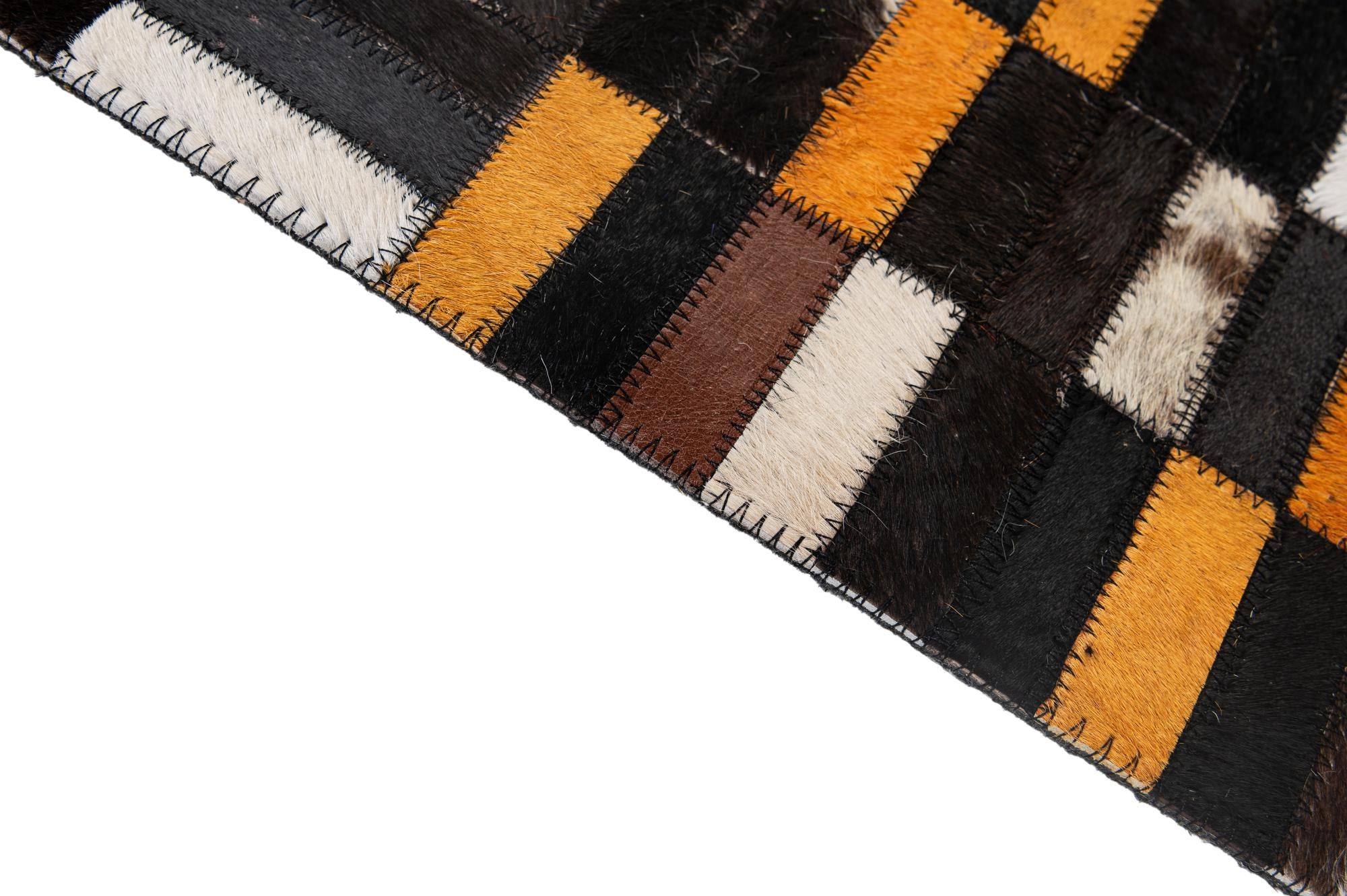 4' 11 x 8' 1 Cowhide - Patchwork Rug