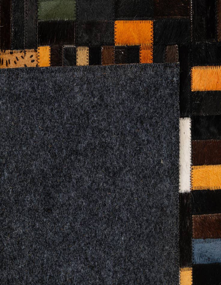 Detail image of 4' 11 x 8' 1 Cowhide - Patchwork Rug