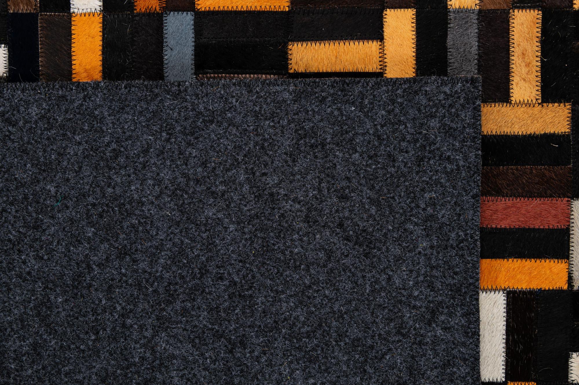 5' 2 x 8' 1 Cowhide - Patchwork Rug