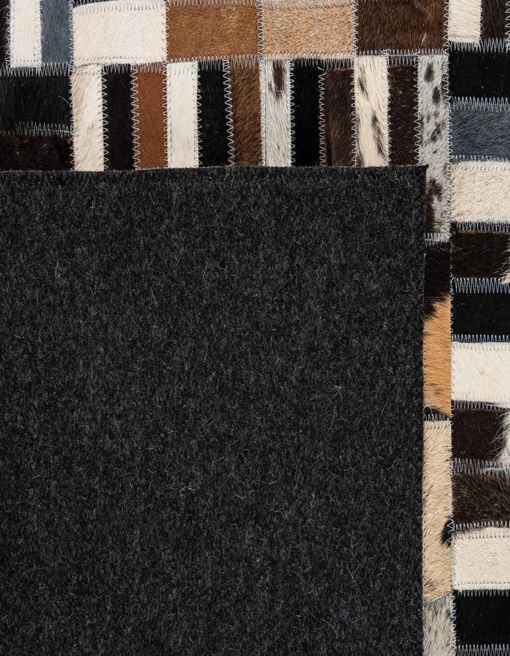 Detail image of 5' 1 x 7' 11 Cowhide - Patchwork Rug