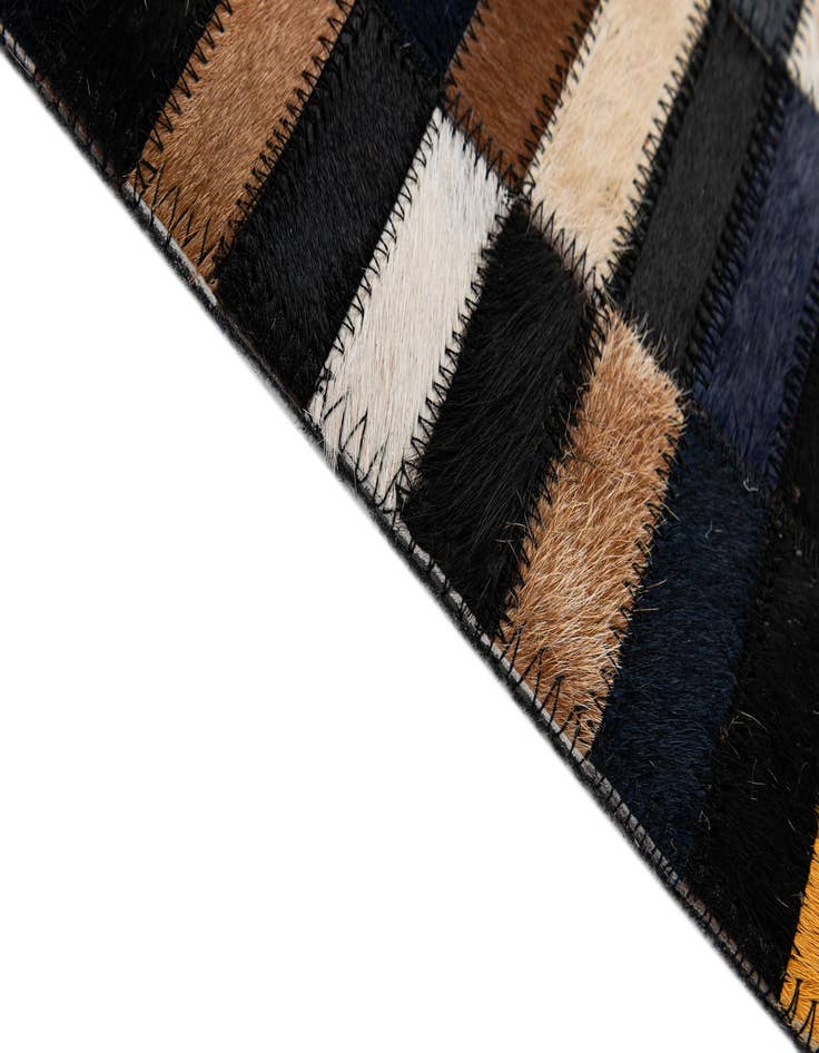 Detail image of 5' 3 x 7' 11 Cowhide - Patchwork Rug