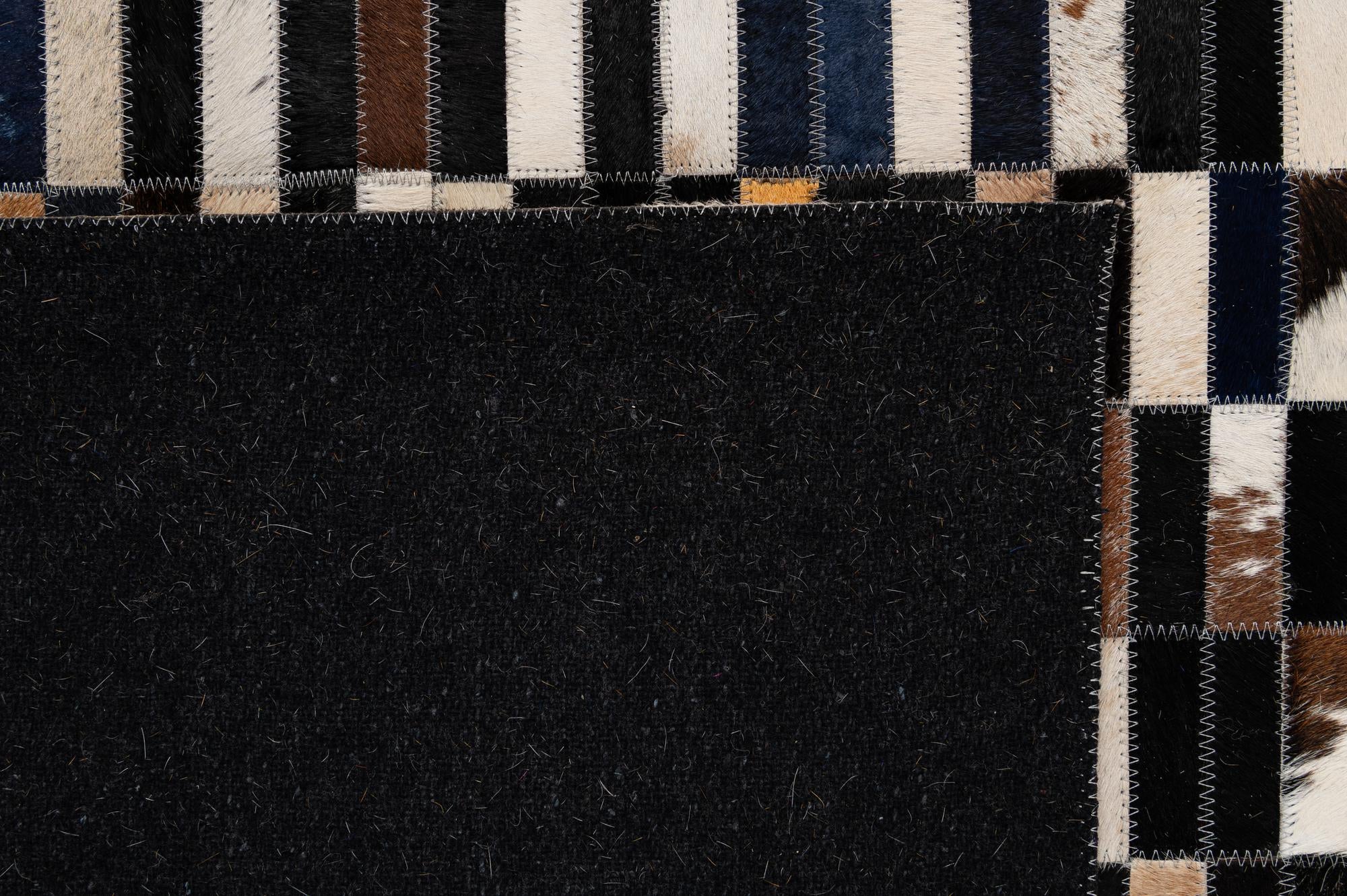 5' 1 x 7' 11 Cowhide - Patchwork Rug
