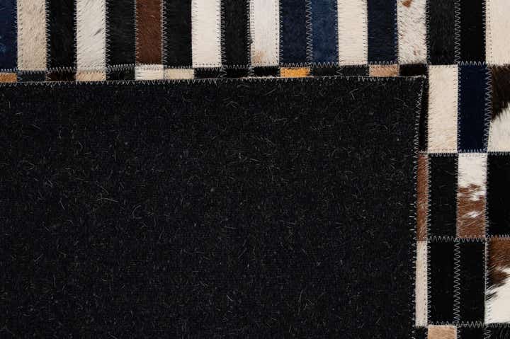 5' 1 x 7' 11 Cowhide - Patchwork Rug