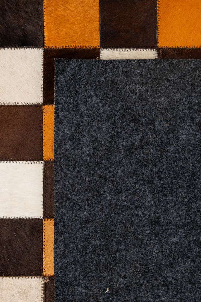 5' 2 x 8' 1 Cowhide - Patchwork Rug