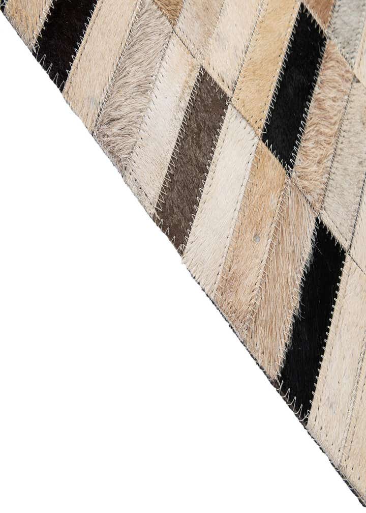 4' 11 x 7' 11 Cowhide - Patchwork Rug