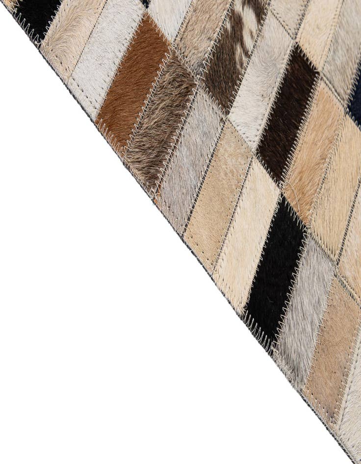 Detail image of 5' 1 x 8' Cowhide - Patchwork Rug