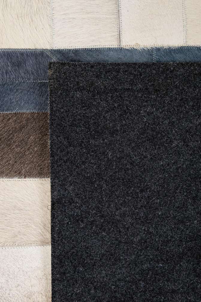 5' 1 x 7' 11 Cowhide - Patchwork Rug