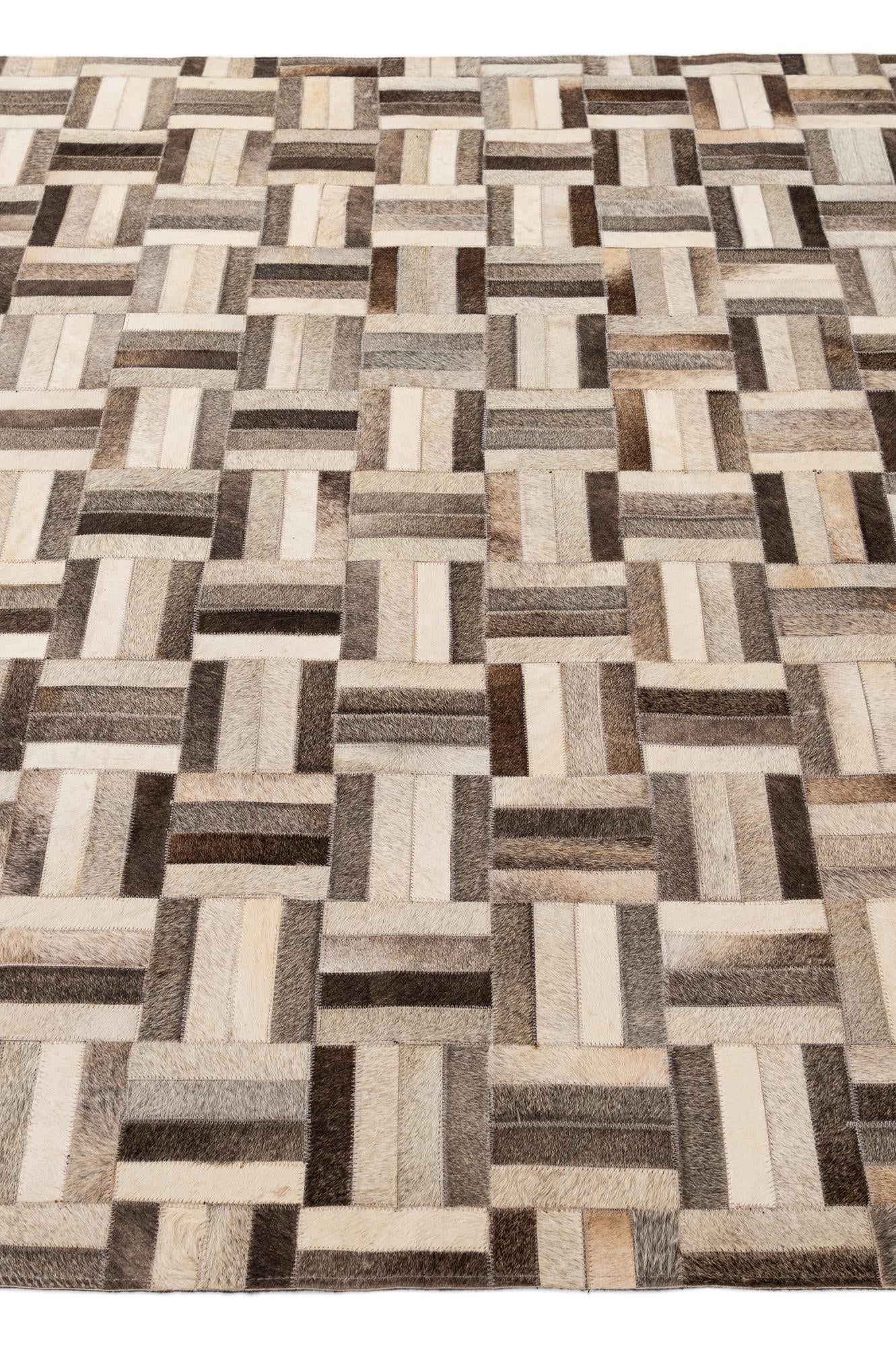 5' 5 x 8' 2 Cowhide - Patchwork Rug