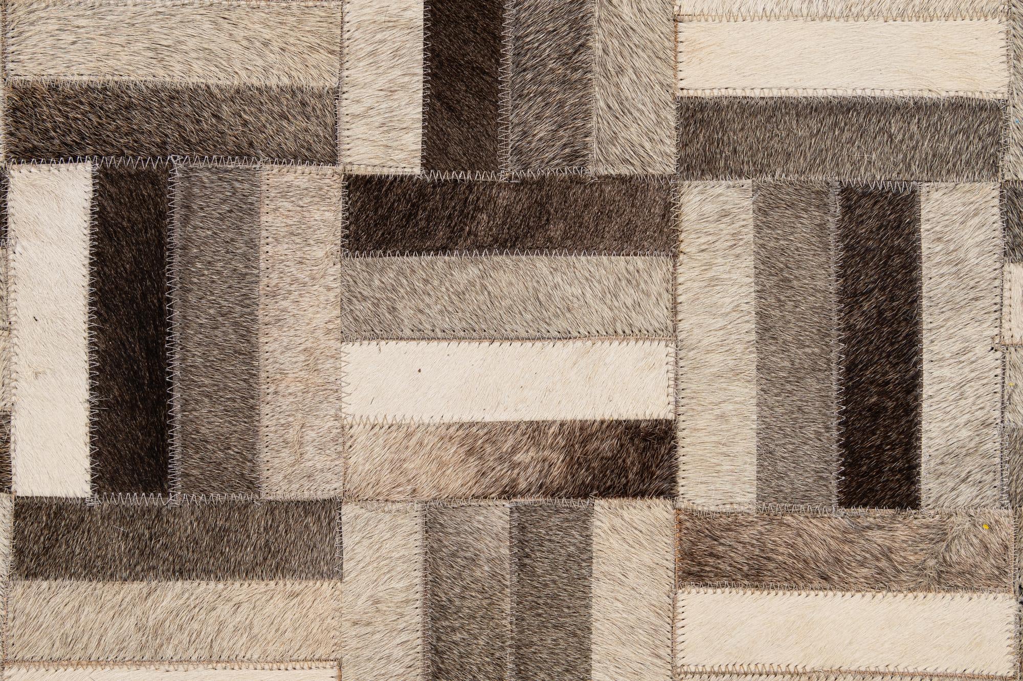 5' 5 x 8' 2 Cowhide - Patchwork Rug