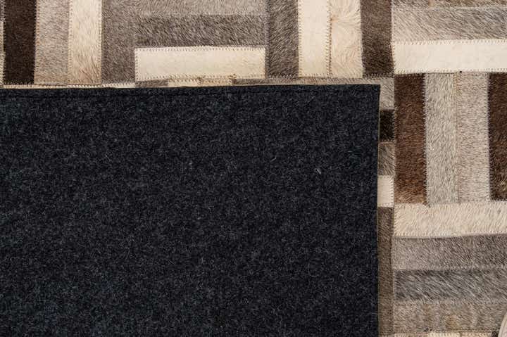 5' 5 x 8' 2 Cowhide - Patchwork Rug