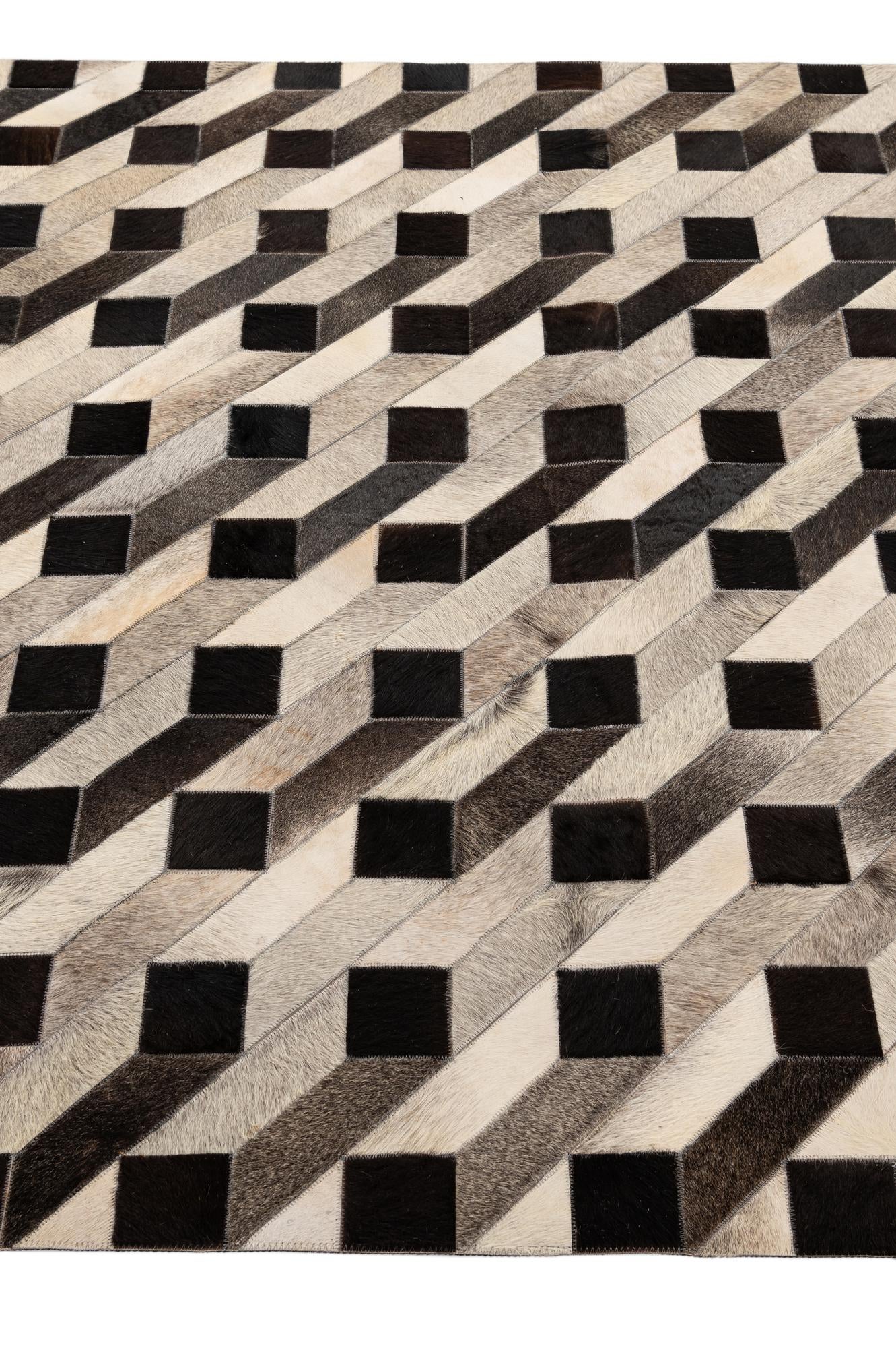 5' 2 x 8' 2 Cowhide - Patchwork Rug