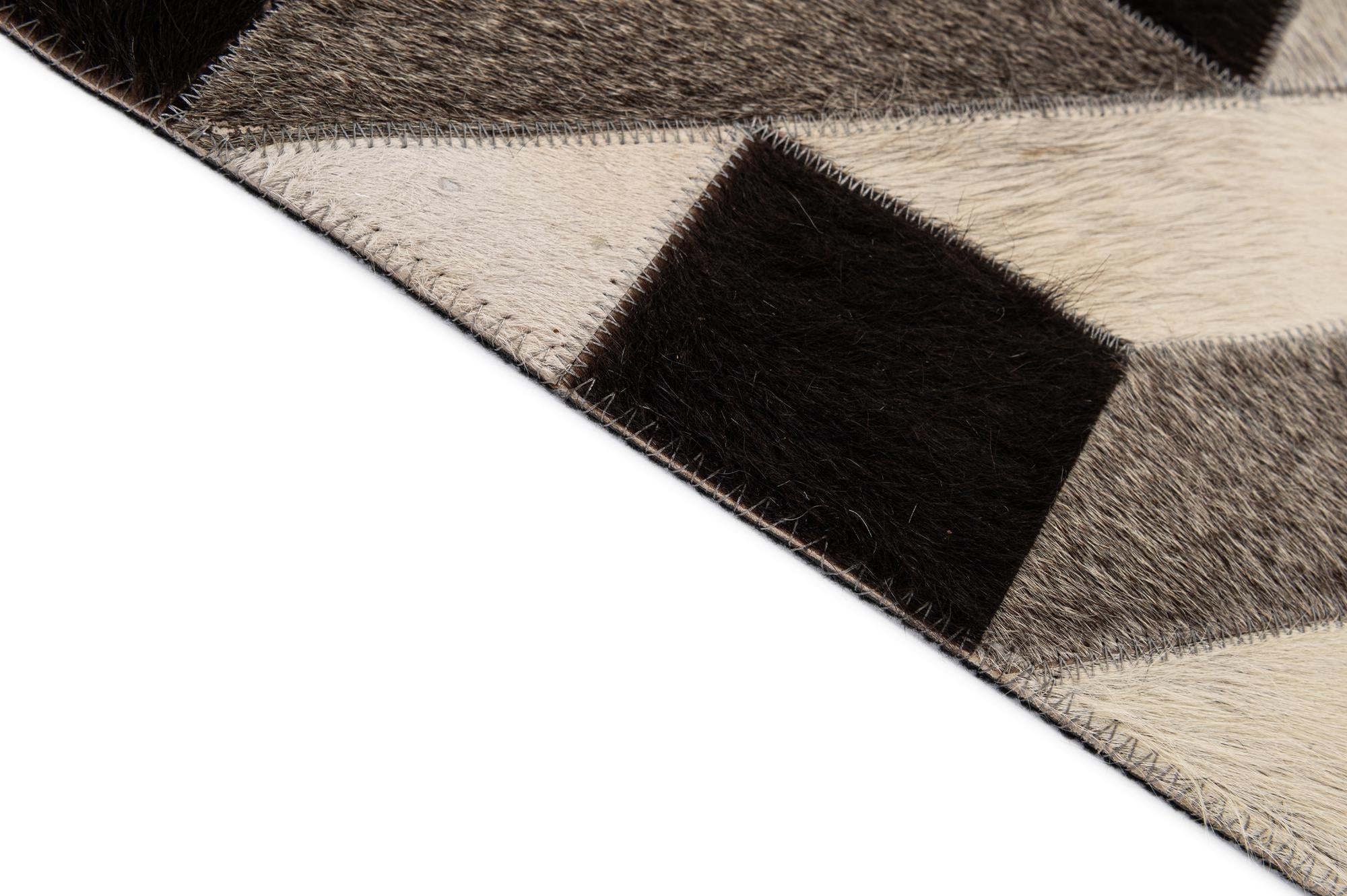 5' 2 x 8' 2 Cowhide - Patchwork Rug