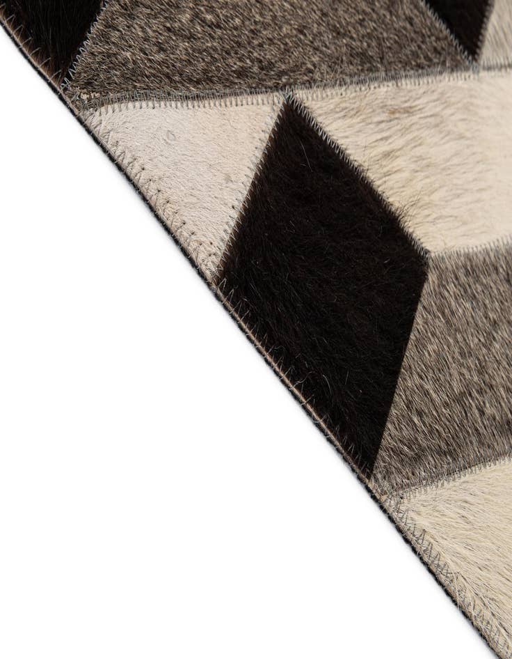 Detail image of 5' 2 x 8' 2 Cowhide - Patchwork Rug