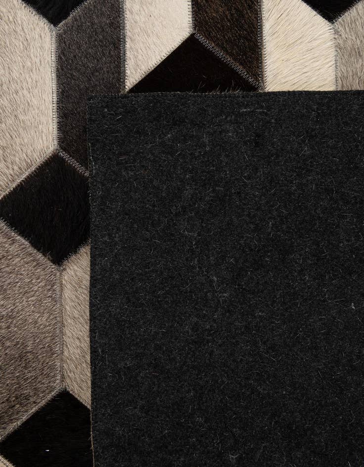 Detail image of 5' 2 x 8' 2 Cowhide - Patchwork Rug