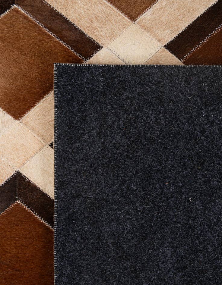 Detail image of 5' 2 x 8' Cowhide - Patchwork Rug