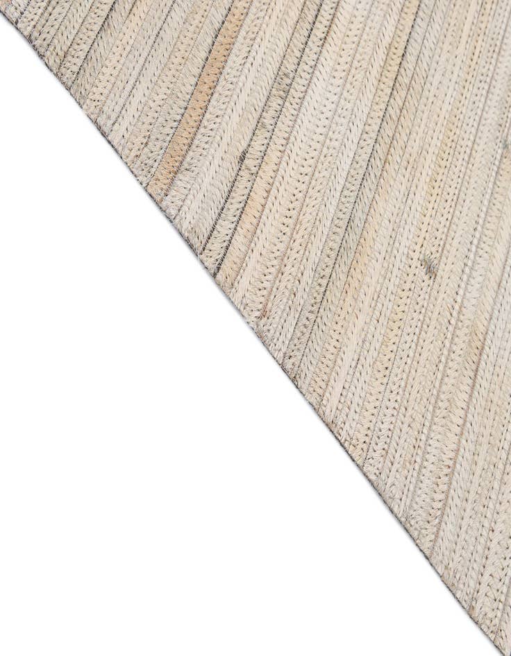 Detail image of 5' 6 x 8' Cowhide - Patchwork Rug