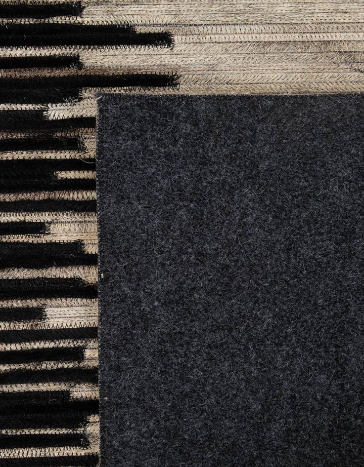 Detail image of 5' 6 x 8' Cowhide - Patchwork Rug