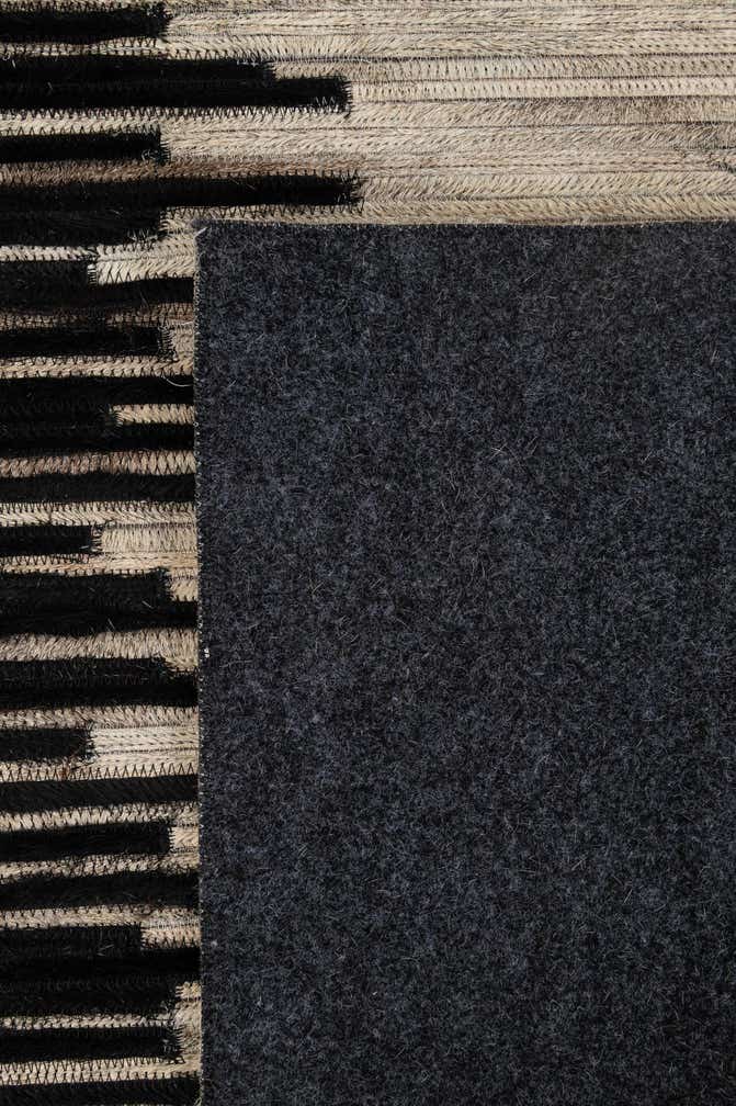 5' 6 x 8' Cowhide - Patchwork Rug
