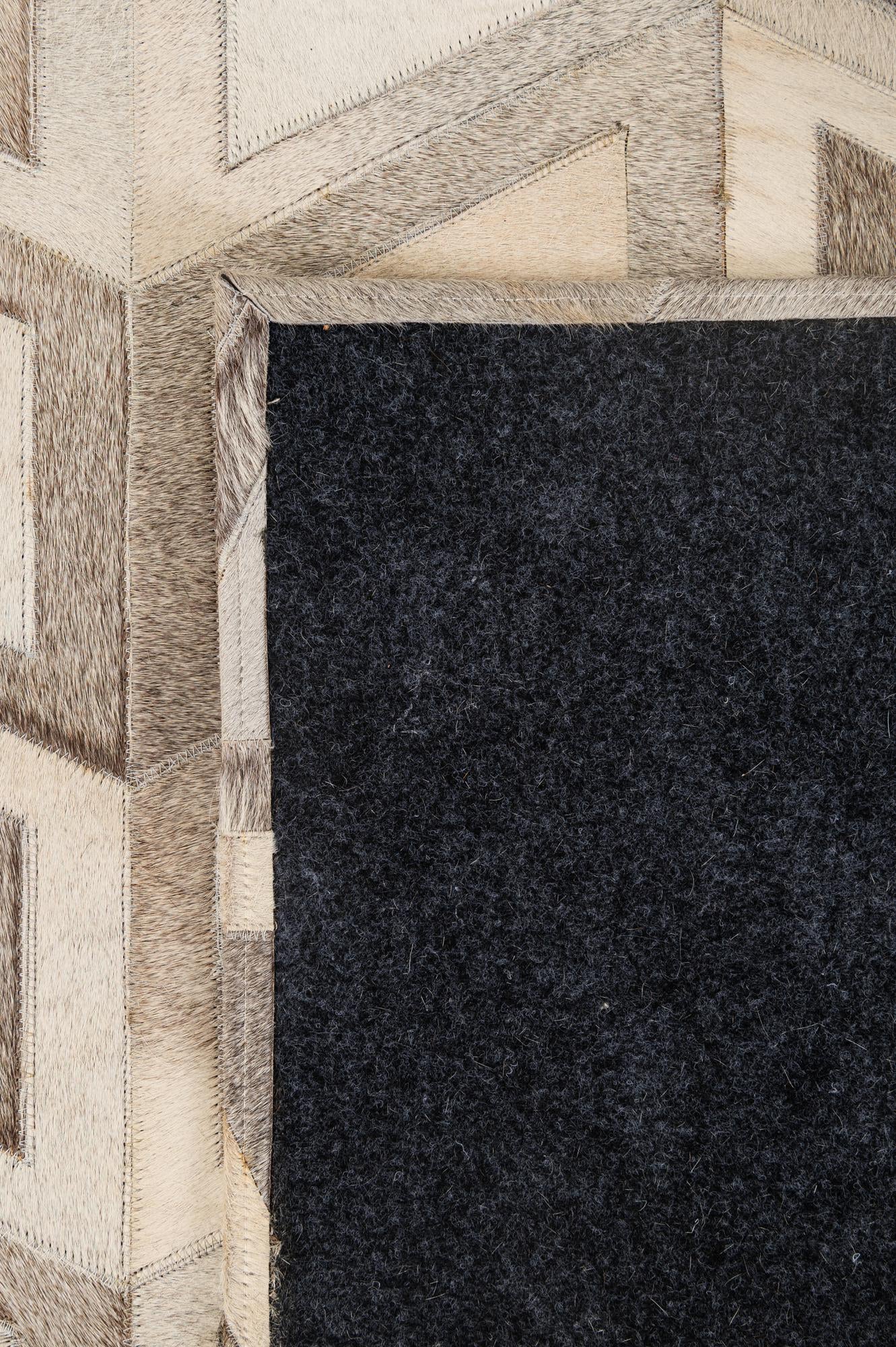 5' 3 x 7' 8 Cowhide - Patchwork Rug
