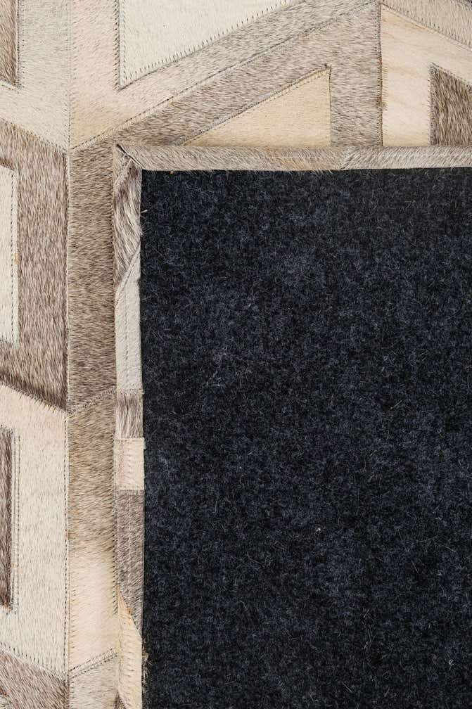 5' 3 x 7' 8 Cowhide - Patchwork Rug